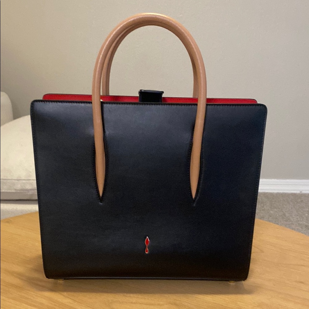 Elegant Black Handbag with Red Accent